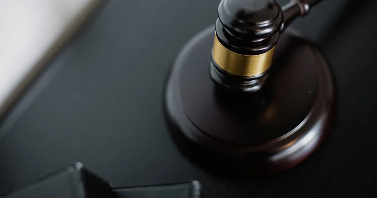 Courtroom gavel — regulators forcing exchanges to delist Monero