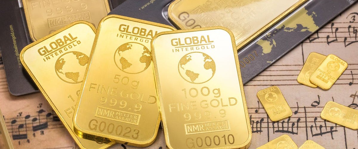 Gold bars representing tokenized real-world assets