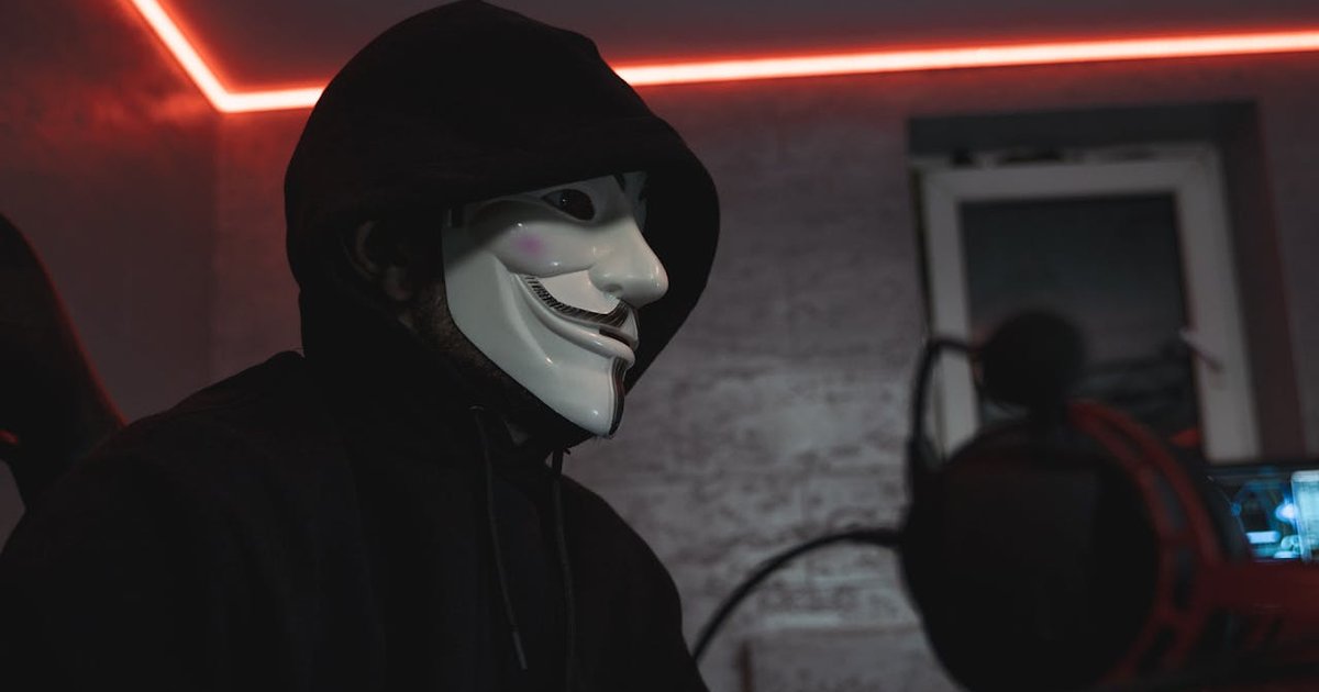 An anonymous figure at a computer — true VPN privacy requires both anonymous payment and no-identity registration